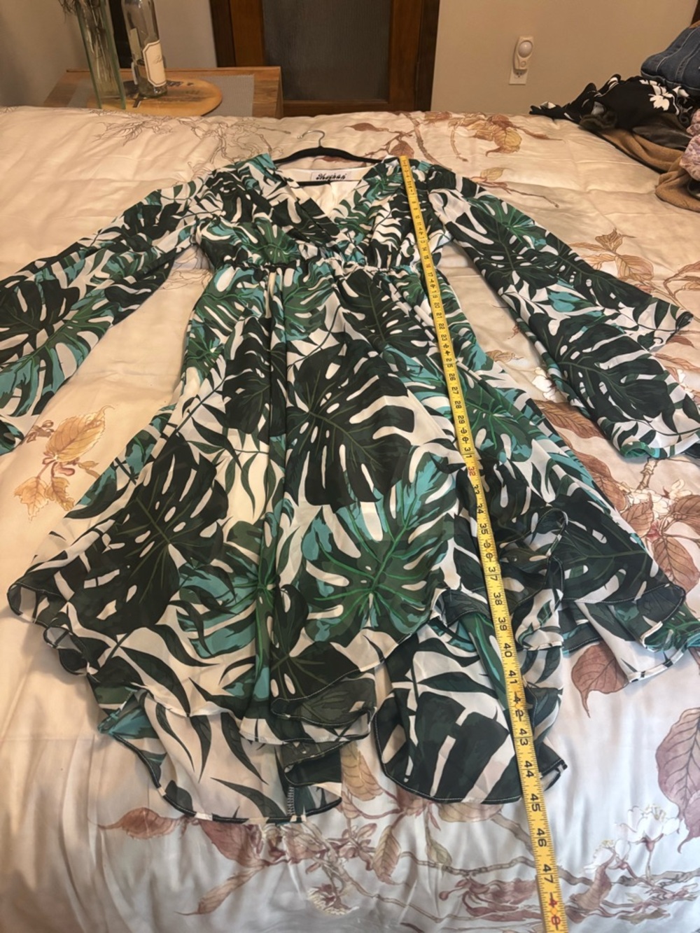 Meghan tropical print dress. Size medium. Asymmetrical/ handkerchief hem.